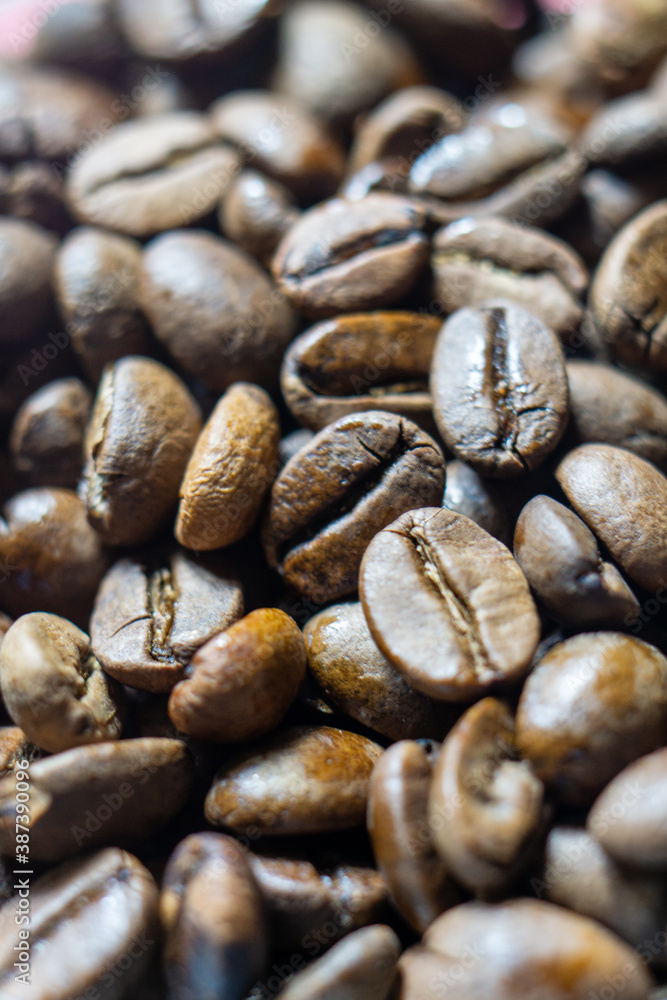 A closeup shot of dark roasted coffee beans in Kandy, Sri Lanka A closeup shot of dark roasted coffee beans in Kandy, Sri Lanka