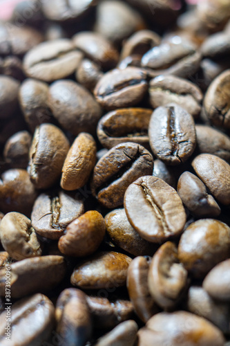 A closeup shot of dark roasted coffee beans in Kandy, Sri Lanka