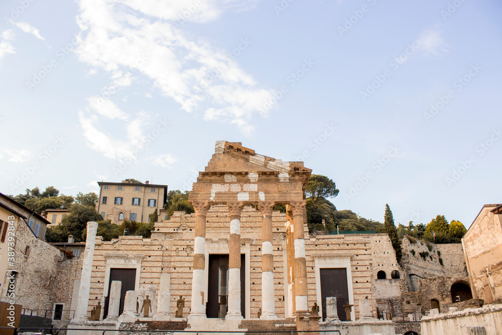The ruins of the Capitolium or Temple of the Capitoline Triad in Brescia, Italy, main temple in the center of the ancient Roman town of Brixia
