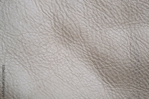 White natural leather, close-up, isolated background for design