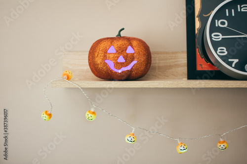 Halloween glitter pumpkin home decor corner design photo