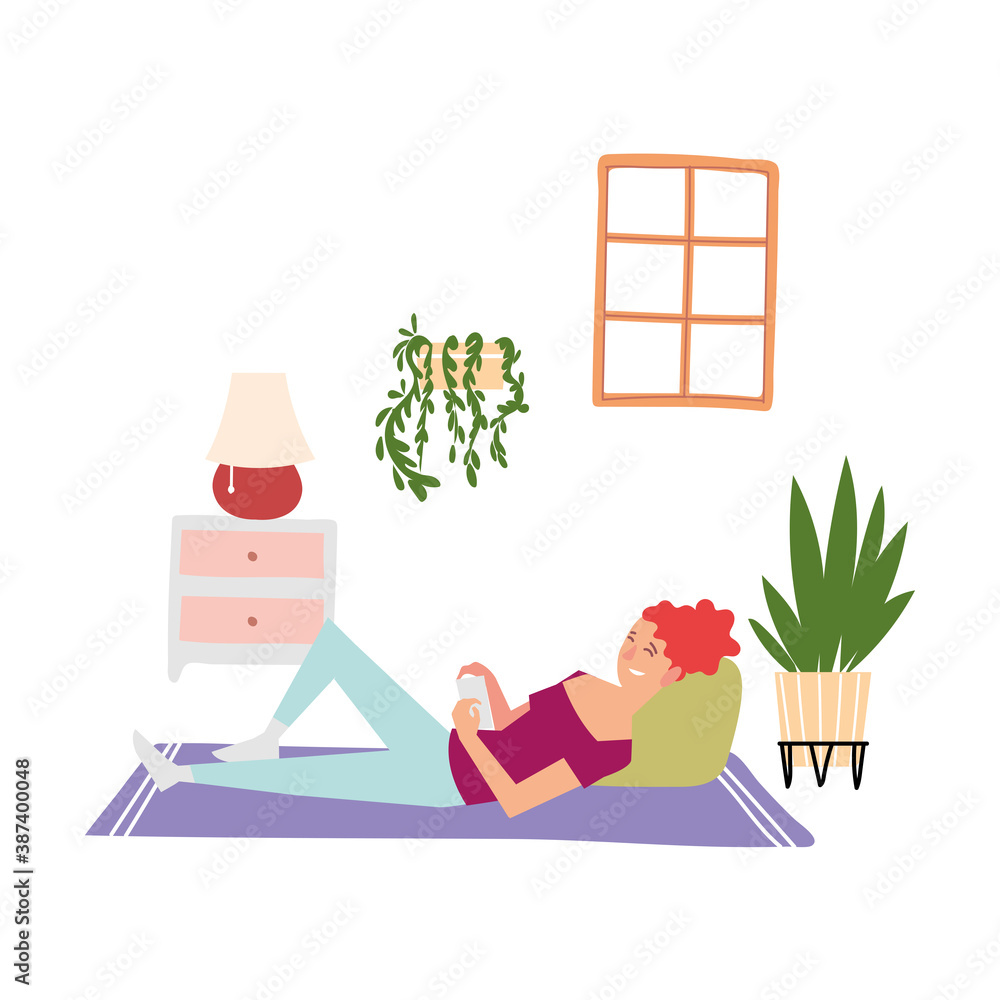 girl lying on carpet using smartphone, indoor activities girl lying on carpet using smartphone, indoor activities