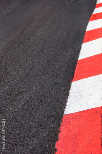 Texture of motor race asphalt and curb Grand Prix circuit