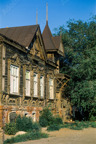 An old Russian wooden house from the times of the Russian Empire with elements of carved decorations. Astrakhan, Russia.