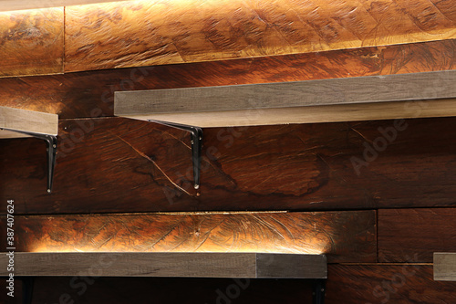 Shelf lighting with old wood background