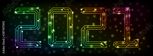 Multicolor circuit printed board in the shape of 2021 with bokeh
