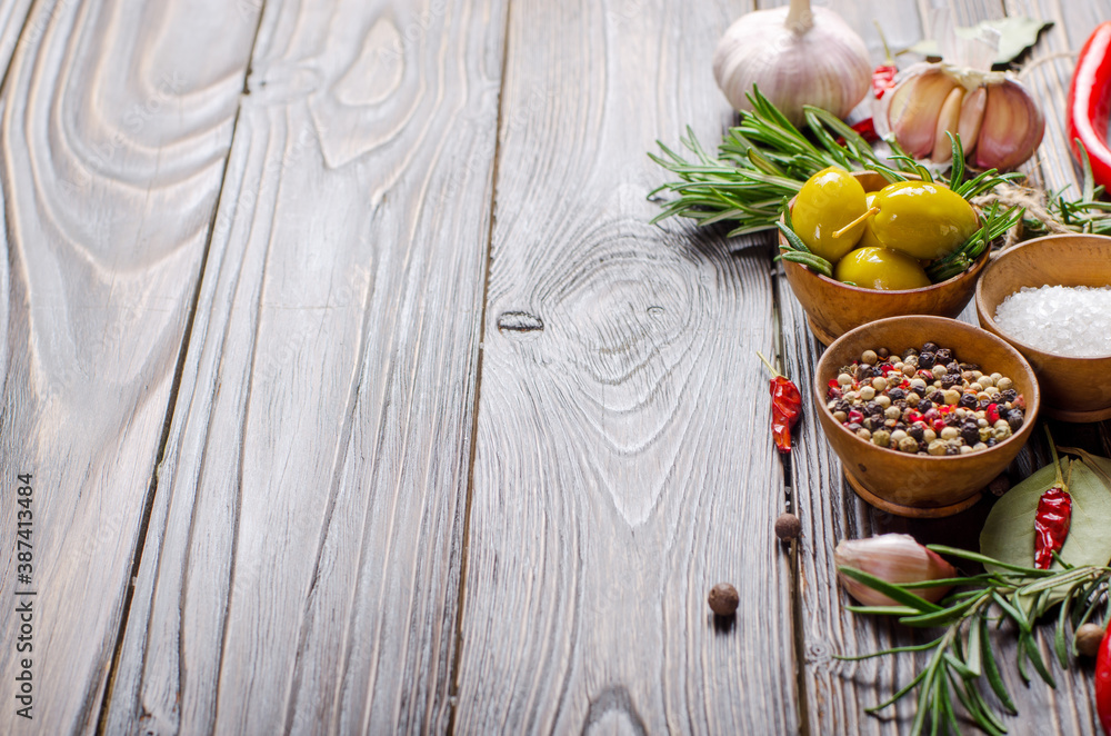 Food background frame made of oils condiments and spices on kitchen table. Cooking concept Food background frame made of oils condiments and spices on kitchen table. Cooking concept