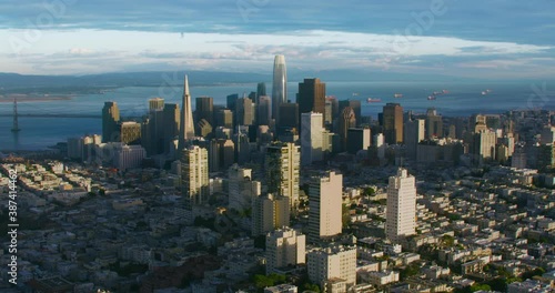 San Francisco Financial District aerial view. Famous skyscrapers. Bay bridge in the background. California, United States. Shot on Red weapon 8K. photo