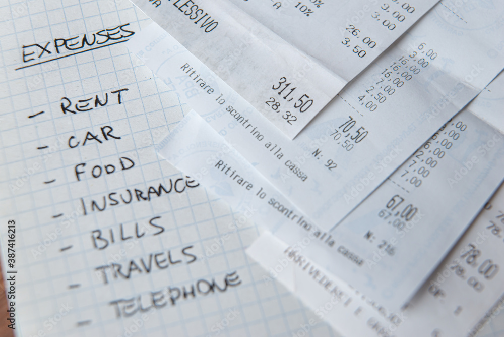 List of daily living expenses, with tax receipts next to it. List of daily living expenses, with tax receipts next to it.