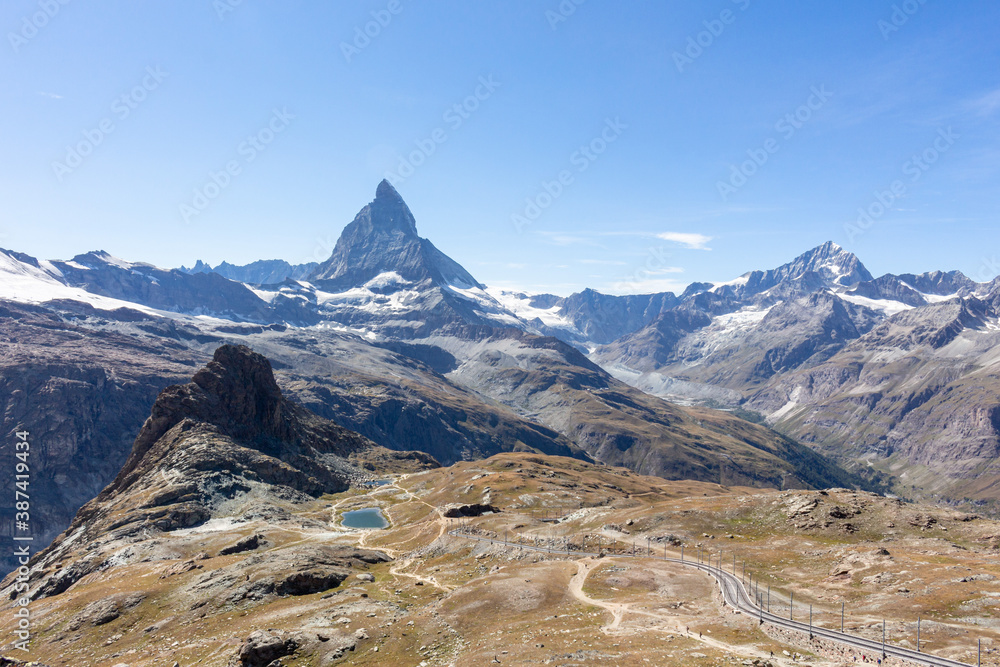 Matterhorn Mountain with white snow and blue sky in summer in Switzerland