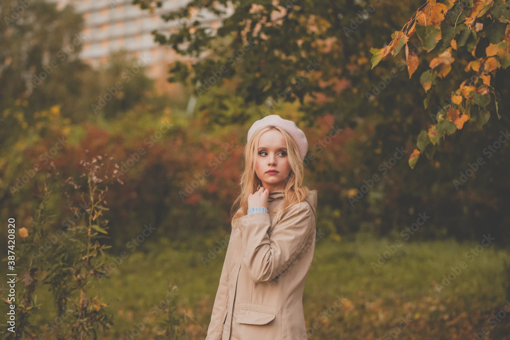 Attractive autumn woman on fall nature background Attractive autumn woman on fall nature background