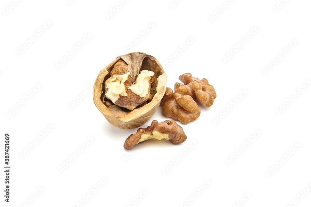 Cracked walnut isolated on white background Cracked walnut isolated on white background
