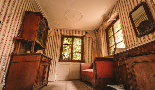 Tablou pe pânză An old abandoned manor house with antique furniture and wonderful architecture