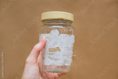 Removing sticky labels from glass jars. Hard to remove tags photo