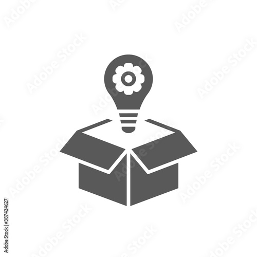 Creative solution black glyph icon. Idea generation. Smart innovative thought. Successful strategy. Light bulb in box. Silhouette symbol on white space. Vector isolated illustration