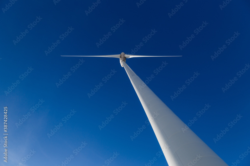 Huge wind turbine with blue sky Huge wind turbine with blue sky