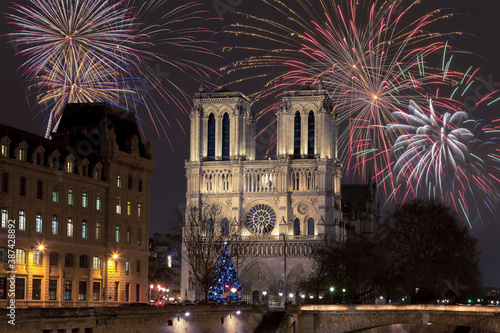 Notre Dame chatedral in Paris (France) with fireworks #387428892