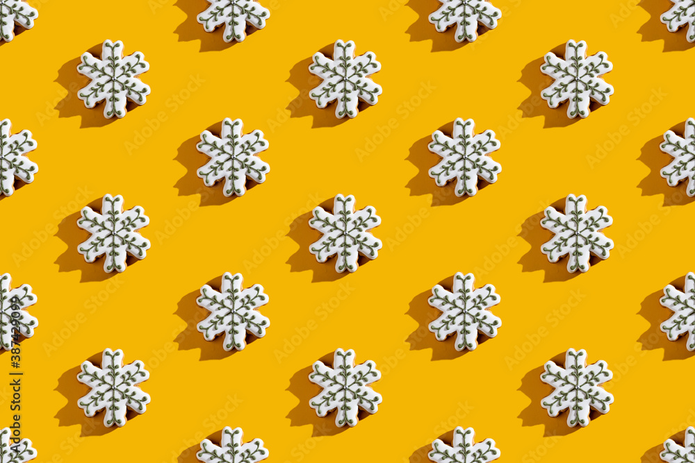 Orange Xmas background. Snowflake seamless pattern. New Year party ornament. White creative adornment minimalist symmetrical composition isolated on bright yellow. Orange Xmas background. Snowflake seamless pattern. New Year party ornament. White creative adornment minimalist symmetrical composition isolated on bright yellow.