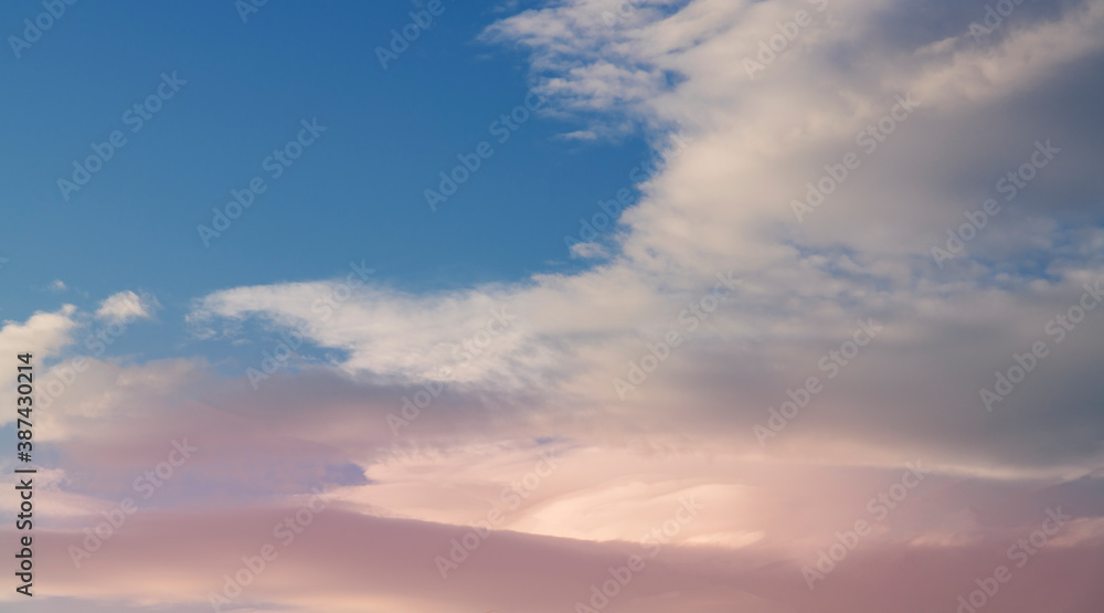 Beautiful colorful sunset sky with clouds. Nature sky background.