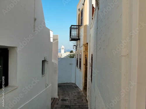 The narrow street in the town of Lindos, Rhodes, Greece