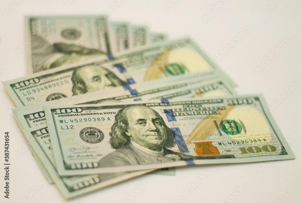 Stacks of paper 100 dollars USA on the white background Stacks of paper 100 dollars USA on the white background
