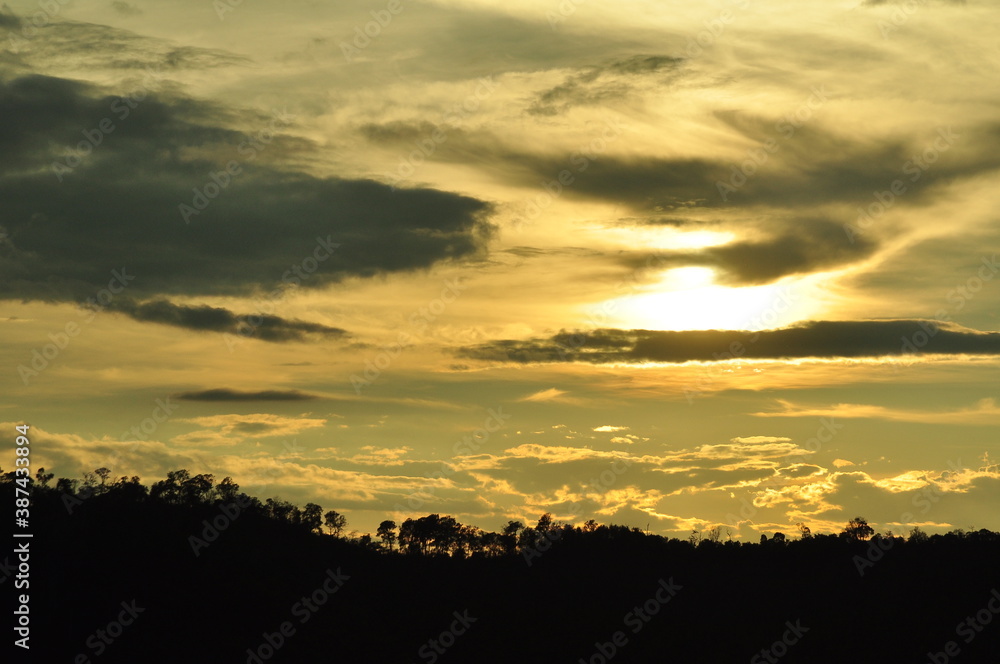 Sunset view with beautiful golden sky,the colorful sky lights in the evening Sunset view with beautiful golden sky,the colorful sky lights in the evening