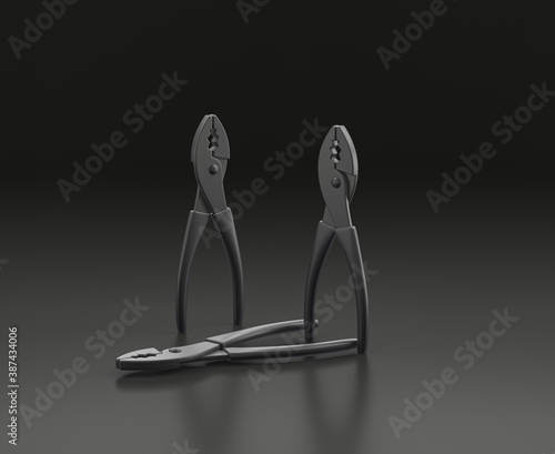 Dark gray pliers on black background, single color workshop tool, 3d rendering photo