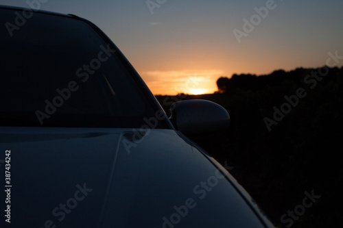 silhouette of car at sunset. Backlighting