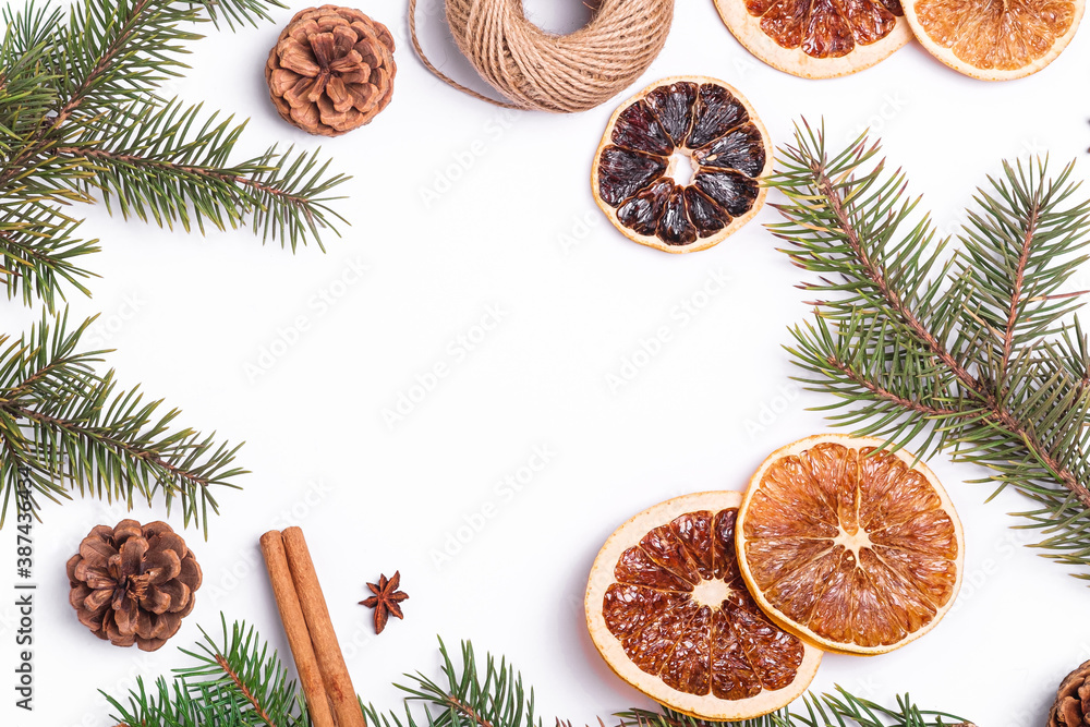 Christmas composition with dried citrus slices, cinnamon, anise, pine cones and fir tree branches, top view copy space Christmas composition with dried citrus slices, cinnamon, anise, pine cones and fir tree branches, top view copy space