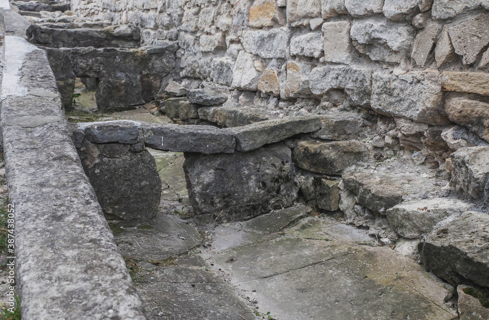 Ancient stone gutter with rapids in the castle