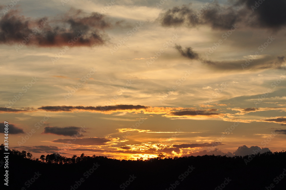 Beautiful golden yellow sky and sun