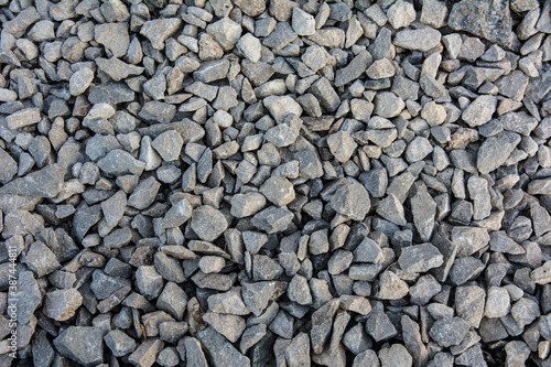 Small stones of gray colour texture background.