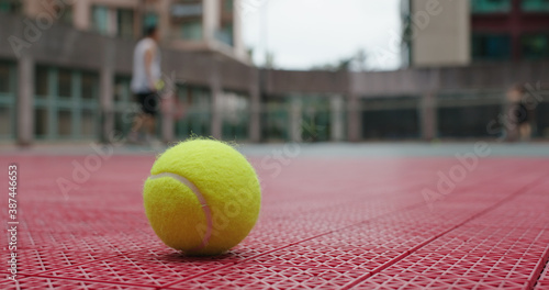 Tennis ball on a tennis court