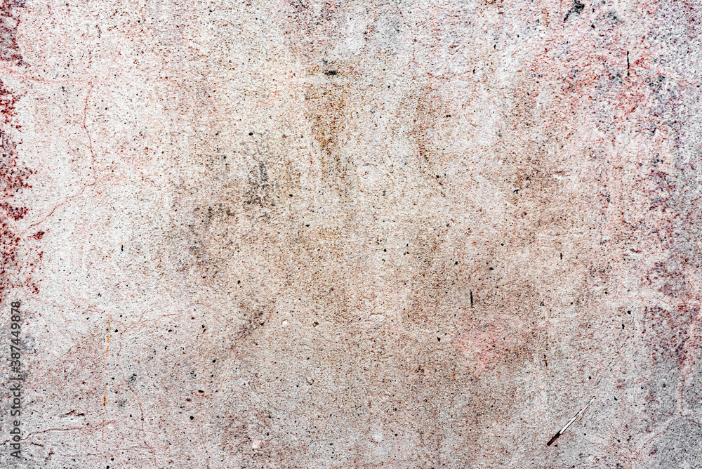Texture of a concrete wall with cracks and scratches which can be used as a background Texture of a concrete wall with cracks and scratches which can be used as a background