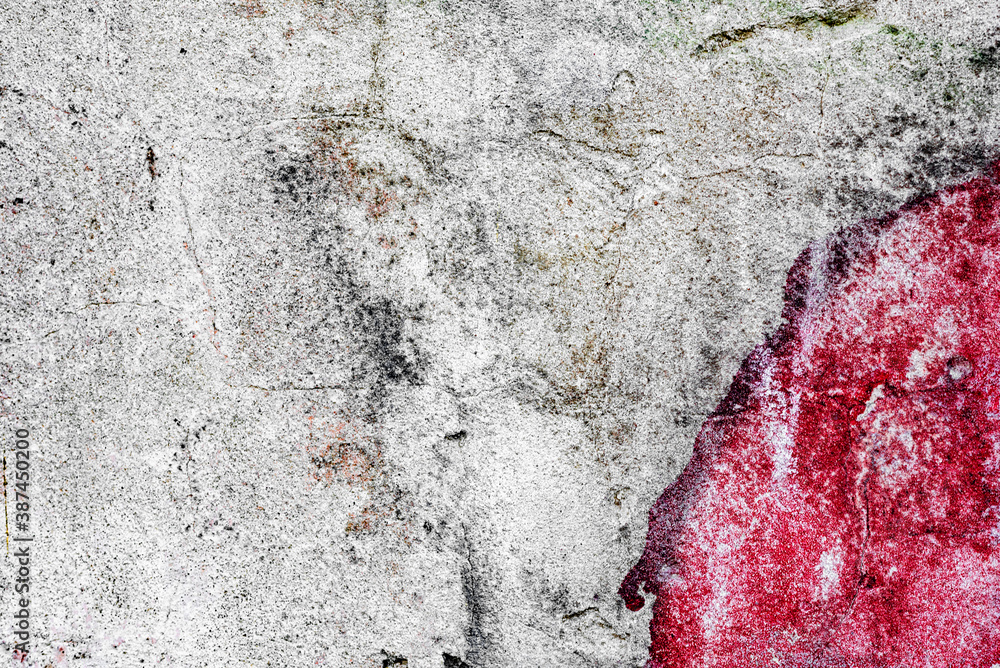Fototapeta premium Texture of a concrete wall with cracks and scratches which can be used as a background