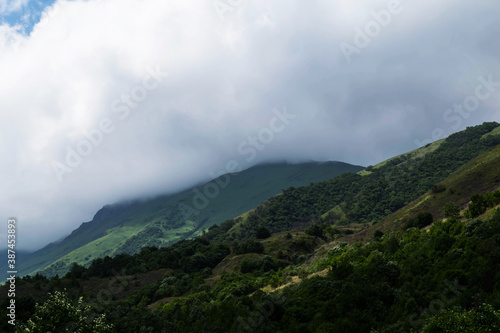 View of the mountains of the North Caucasus. Mountains in the clouds in summer