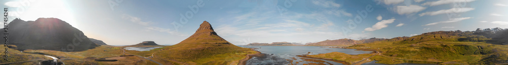 Aerial panoramic view of Kirkjufell mountain landscape in Iceland, drone viewpoint