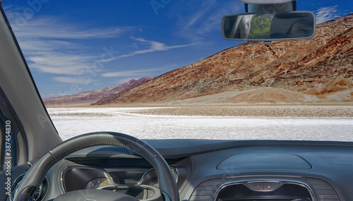 Car windshield with view of Badwater Basin, Death Valley, USA