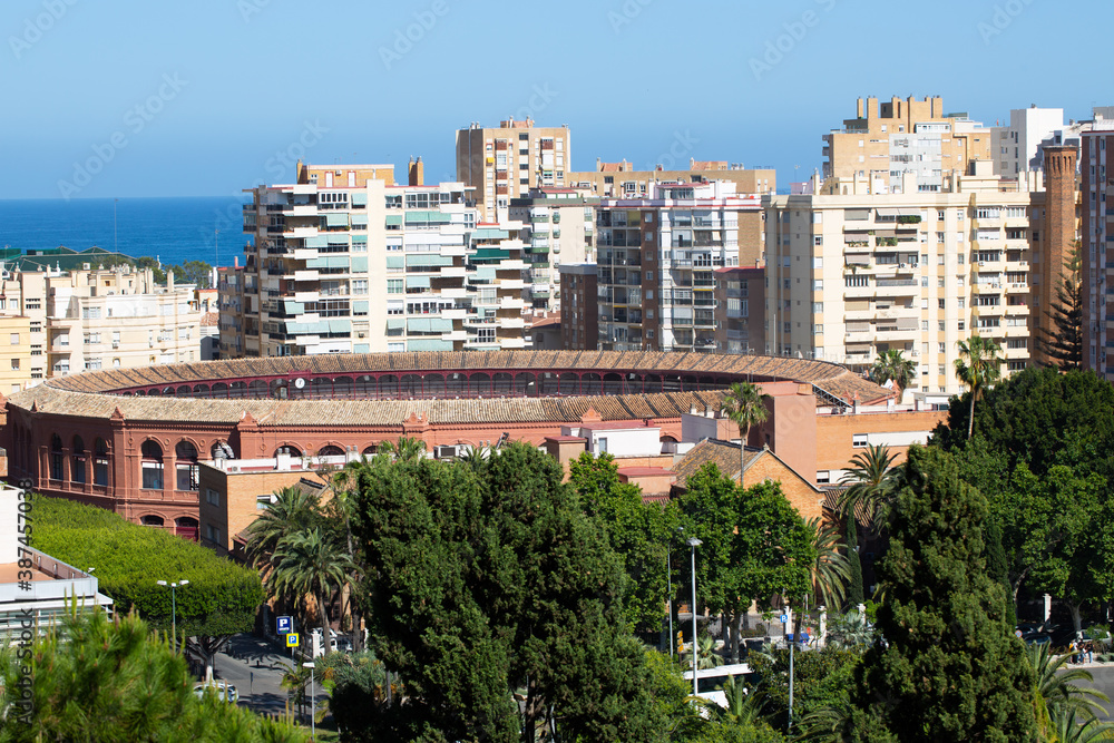 Panoramic view from the mountain to the bullring in Malaga, against the backdrop of the Mediterranean Sea