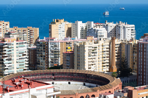 Panoramic view from the mountain to the bullring in Malaga, against the backdrop of the Mediterranean Sea