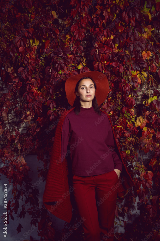 woman in a red hat and red sweater woman in a red hat and red sweater