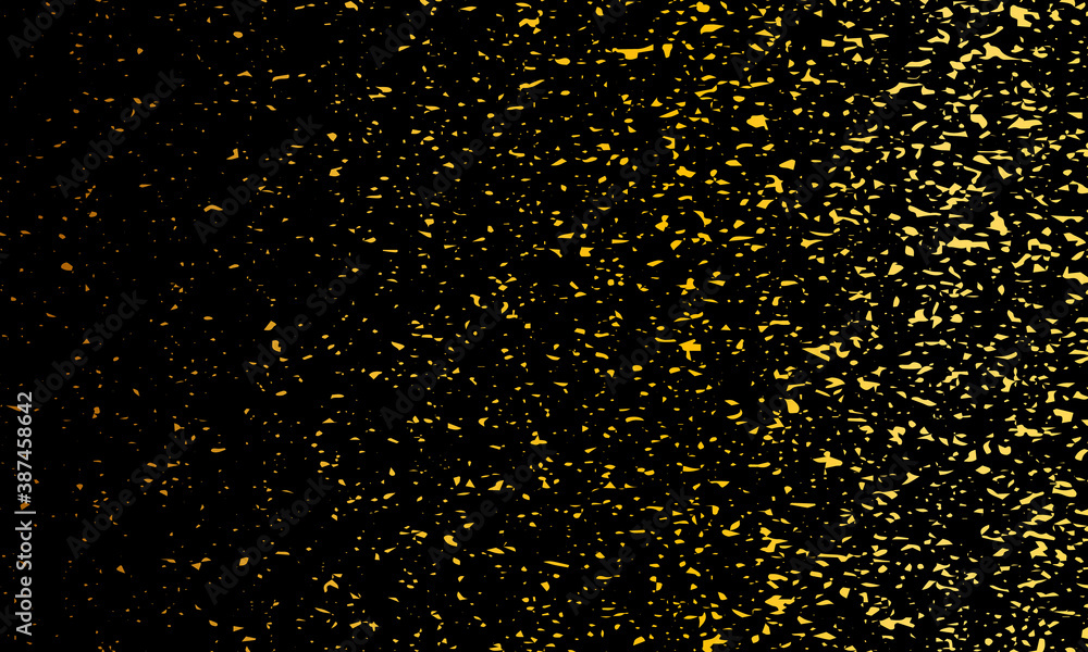 Small golden particles on black background. Gold dust. A high resolution. Magic backdrop.