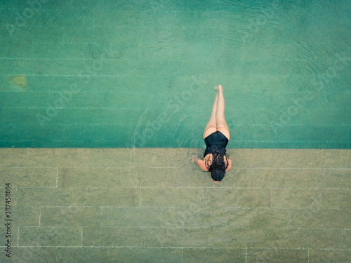 Woman in swimming pool photo