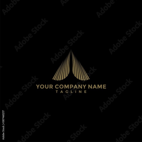 Letter A Monogram Logo Design. with a black background and a gold logo. © Budi