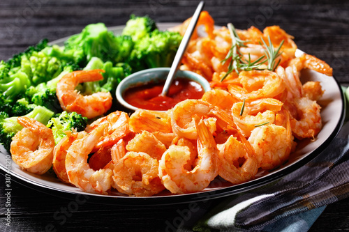 Garlic butter prawns with broccoli, top view
