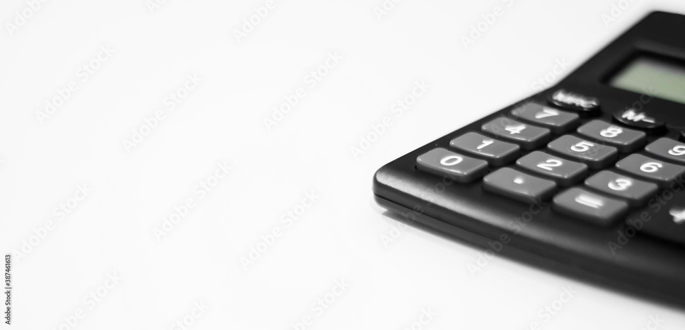 Economic calculator for doing business. Computer on a white background. Economic calculator for doing business. Computer on a white background.