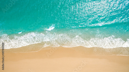 Fototapeta Naklejka Na Ścianę i Meble -  Top view aerial image from drone of an stunning beautiful sea landscape beach with turquoise water with copy space for your text. Beautiful Sand beach with turquoise water, aerial UAV drone shot