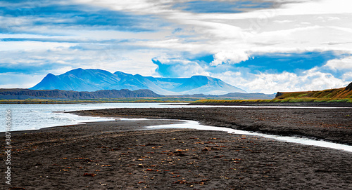 the black beach in Iceland by the basalt rock 