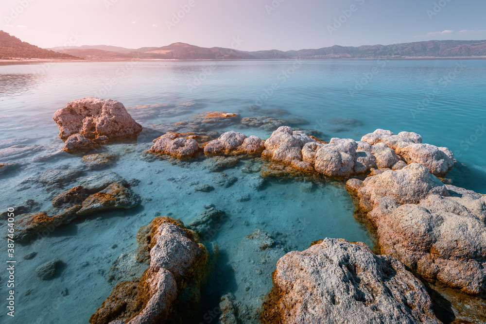 Lake View With Rocks Beautiful and picturesque panoramic view of the lake or sea. Rocky ...