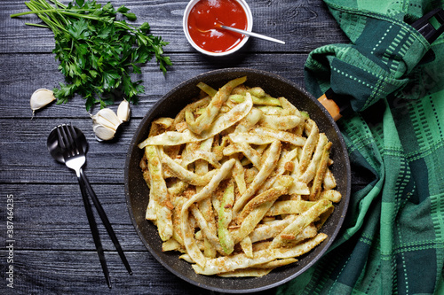 French golden wax beans coated with breadcrumbs photo